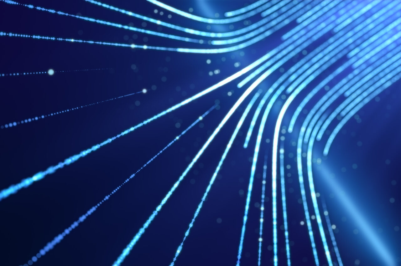 Curved blue light streaks flow across a dark background