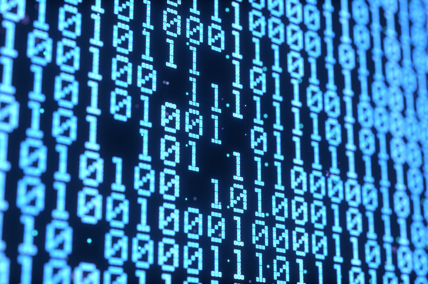 Binary code in glowing blue numerals on a screen