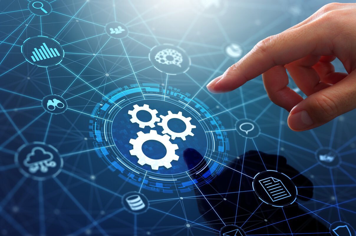 Hand pointing at digital gears on a network interface